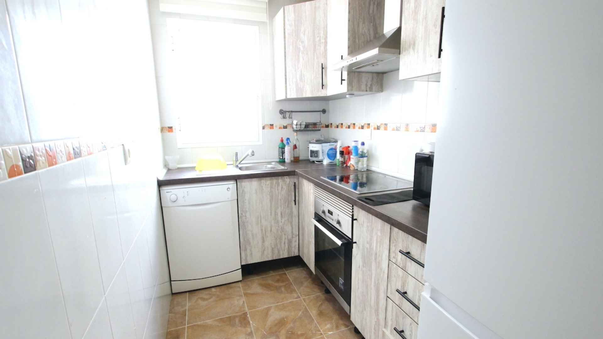 49043_spacious_2_bed_top_floor_apartment_benijofar_high_street_110625164928_img_4263