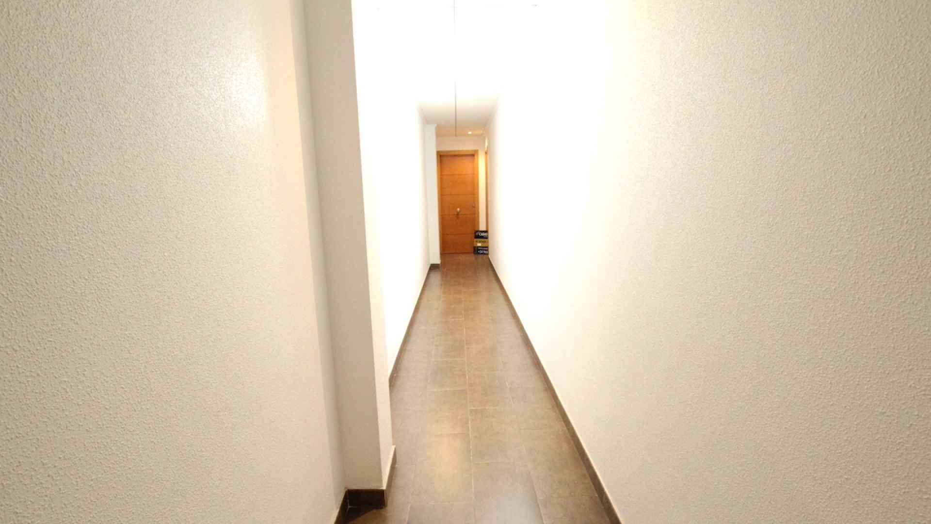 49043_spacious_2_bed_top_floor_apartment_benijofar_high_street_110625164929_img_4246