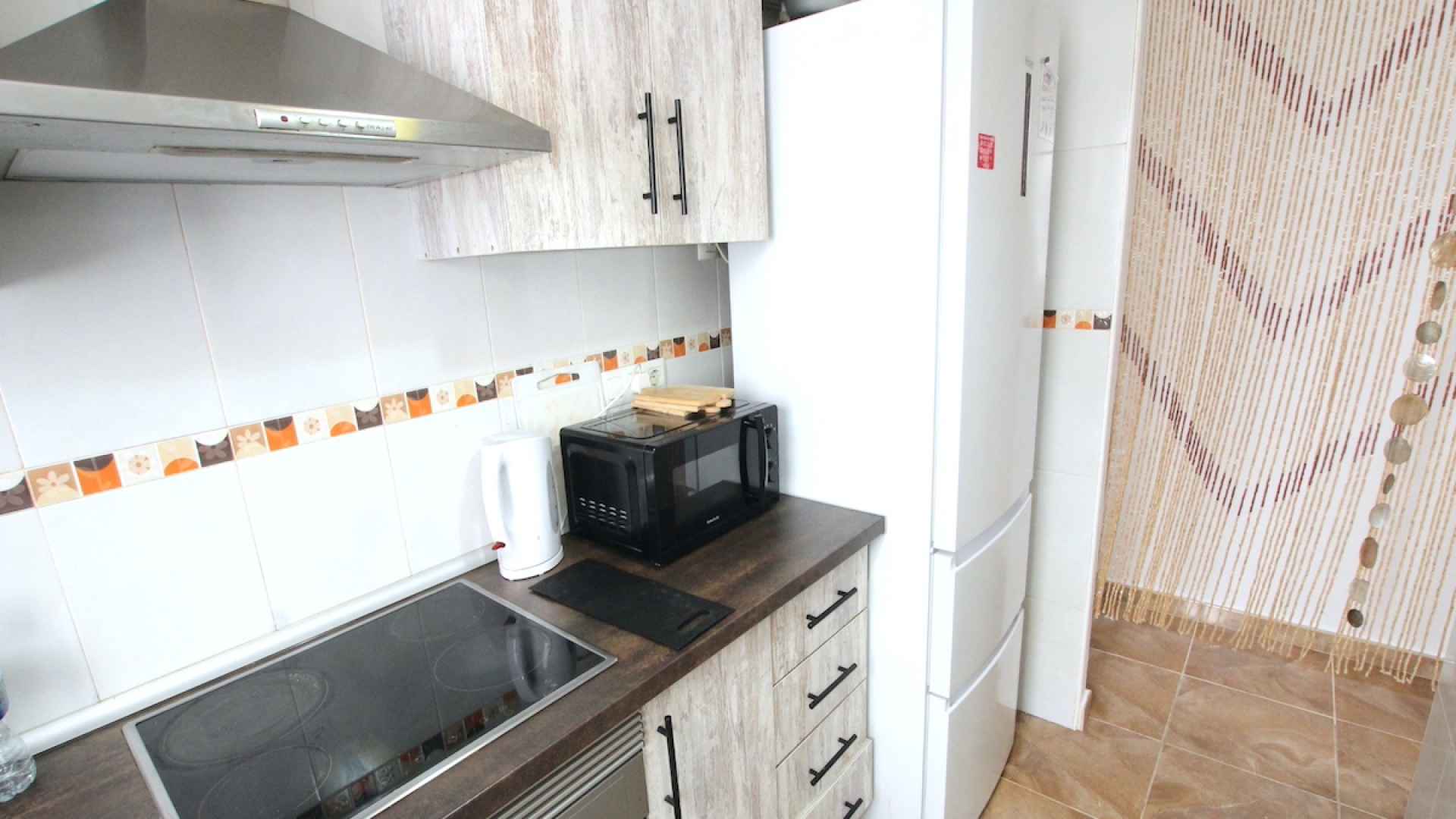 49043_spacious_2_bed_top_floor_apartment_benijofar_high_street_110625164932_img_4267