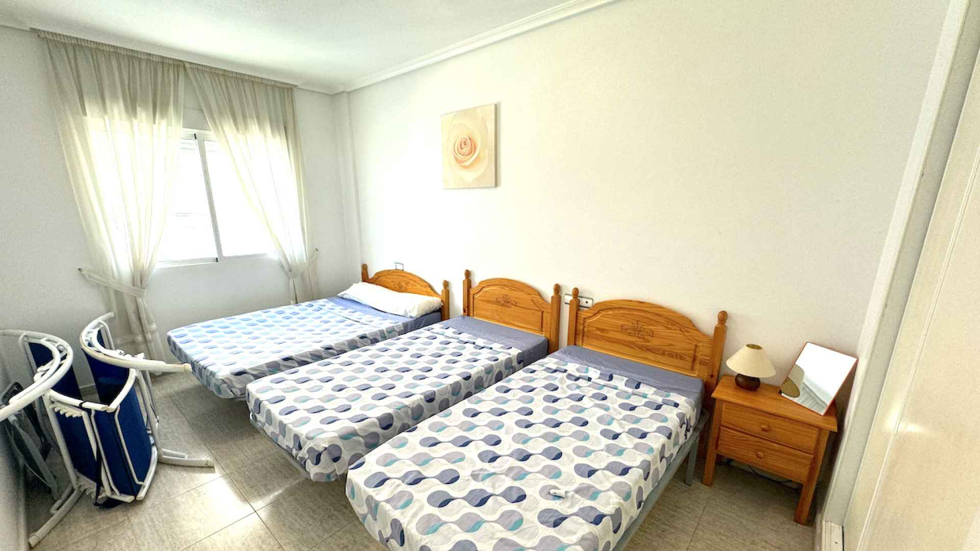 48447_spacious_2_bedroom_ground_floor_apartment_with_pool_views_090524155112_img_2591